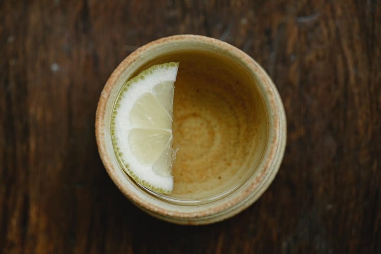 oriental cup of green tea with lemon